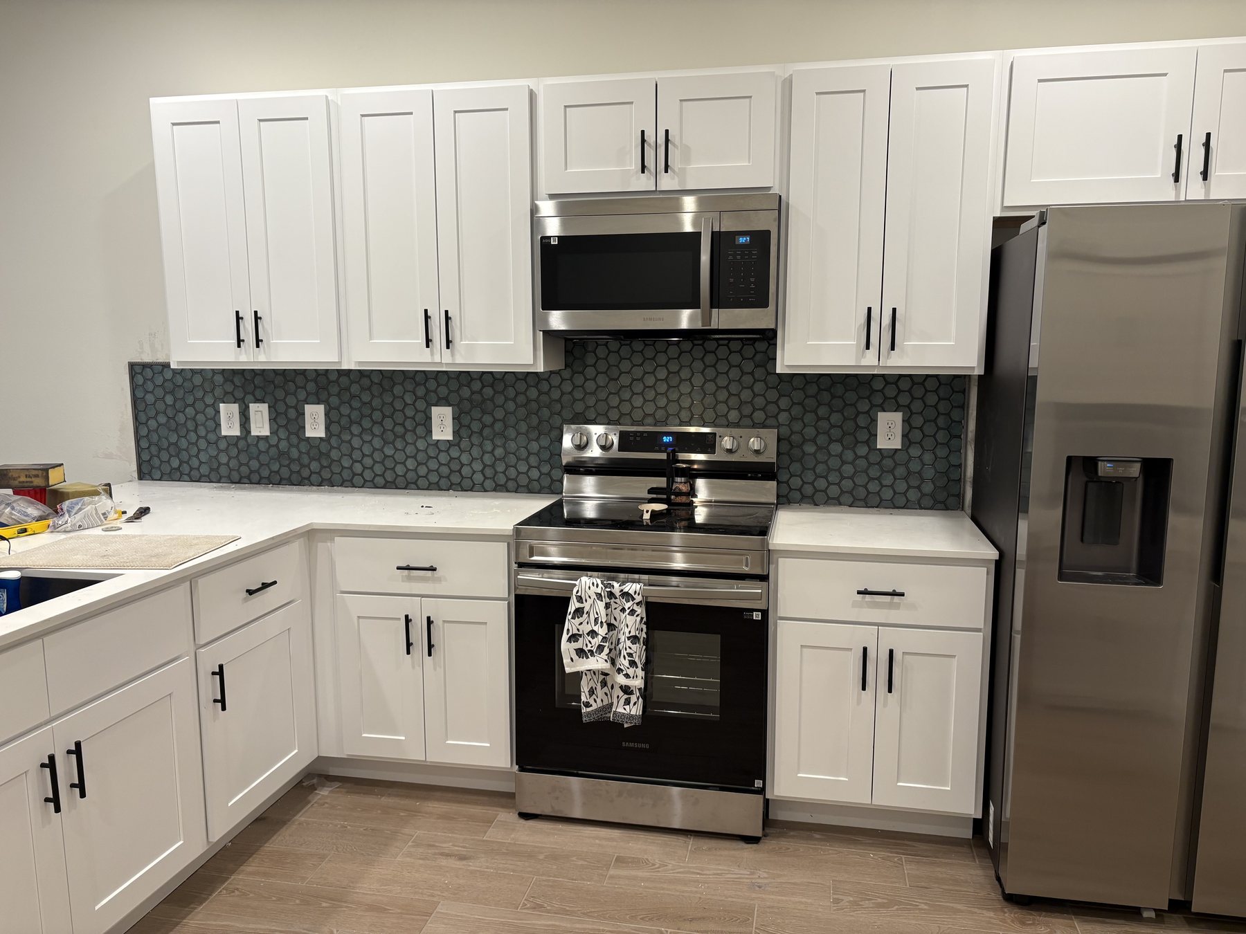 Kitchen cabinet and backsplash update by KDP Builders