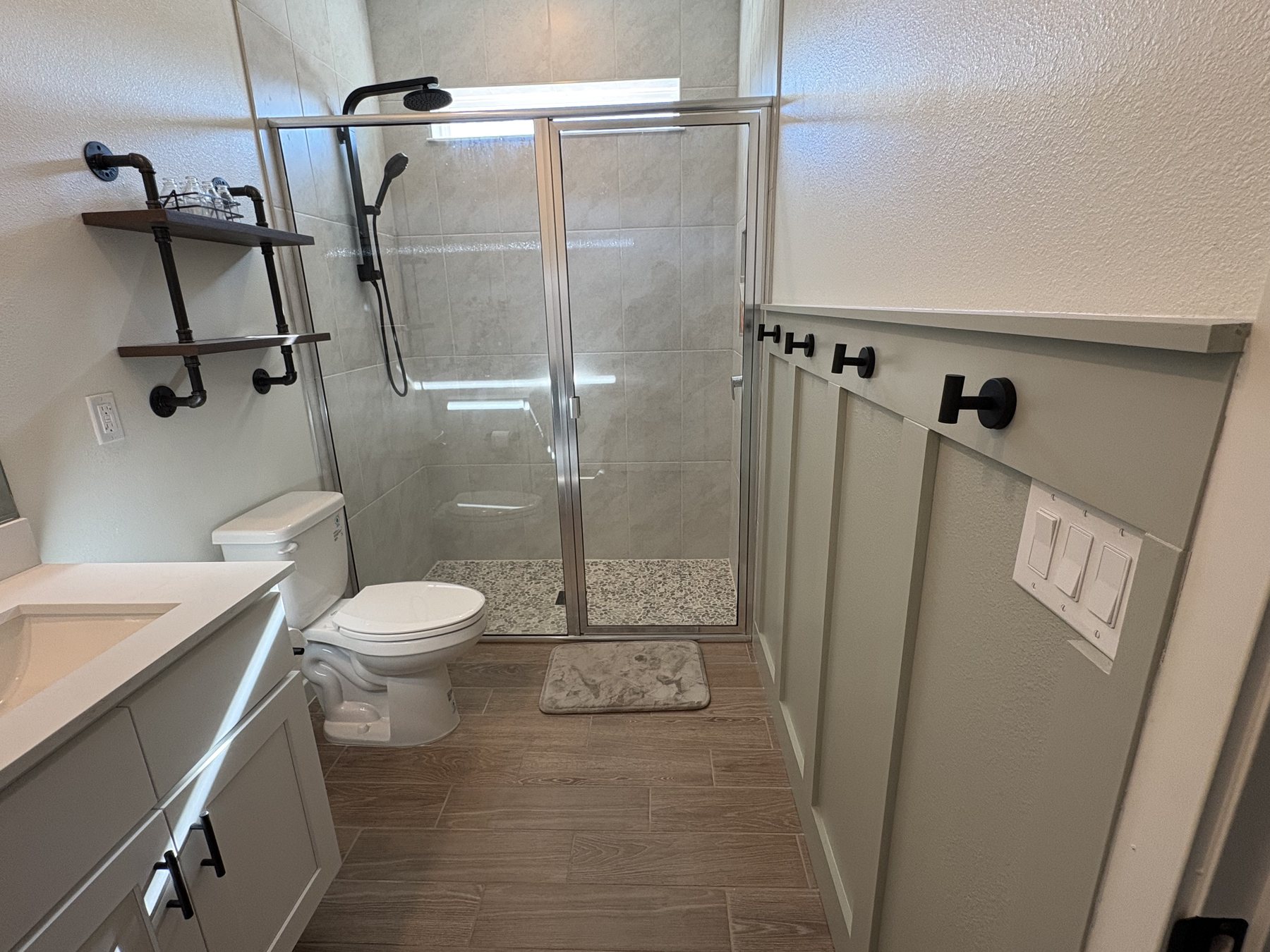 Master bathroom wainscoting and finish work by KDP Builders