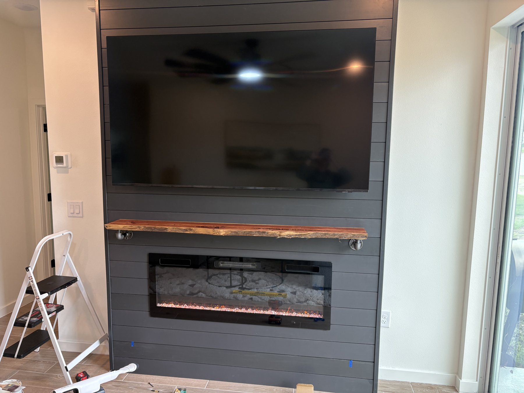 Shiplap fireplace feature wall by KDP Builders