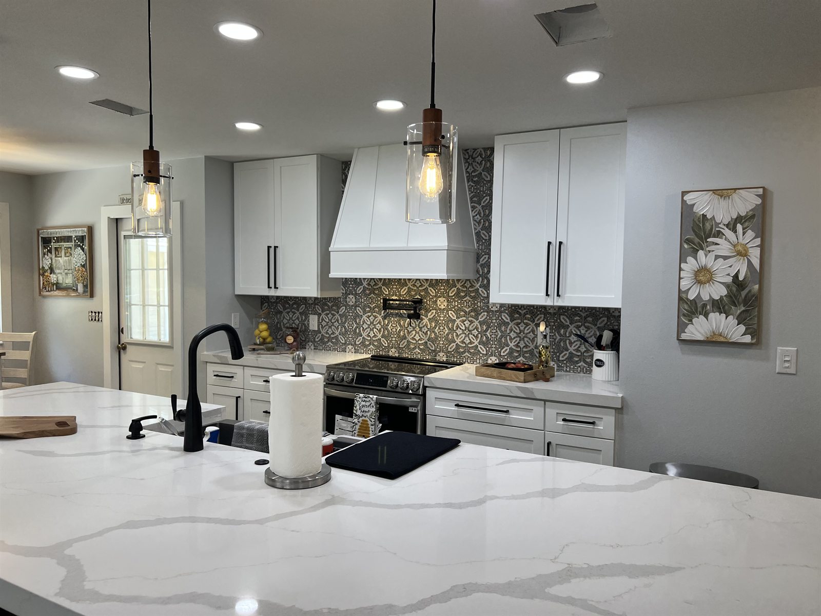 Whole home remodel kitchen island by KDP Builders